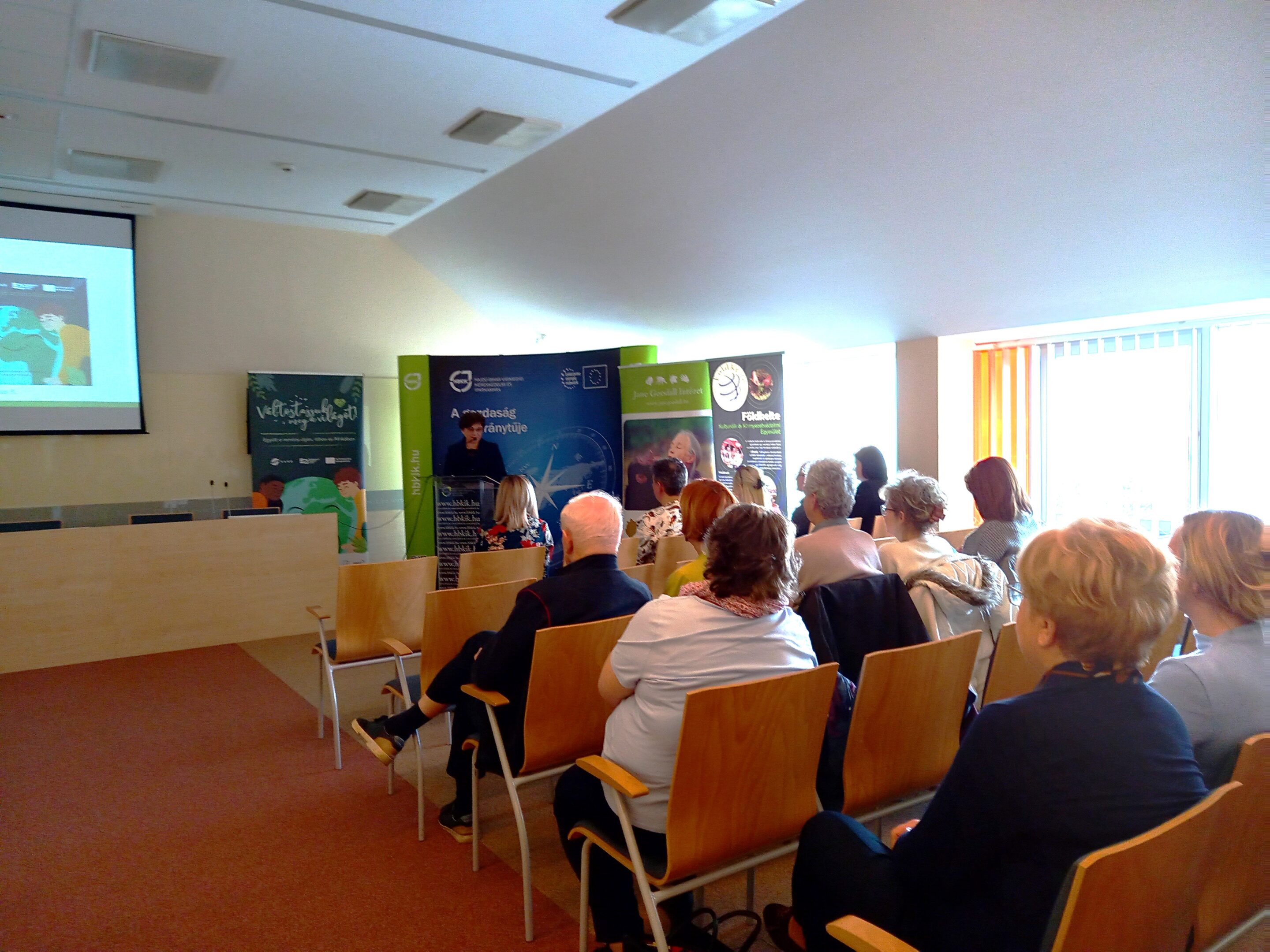 group of people sitting near table meeting